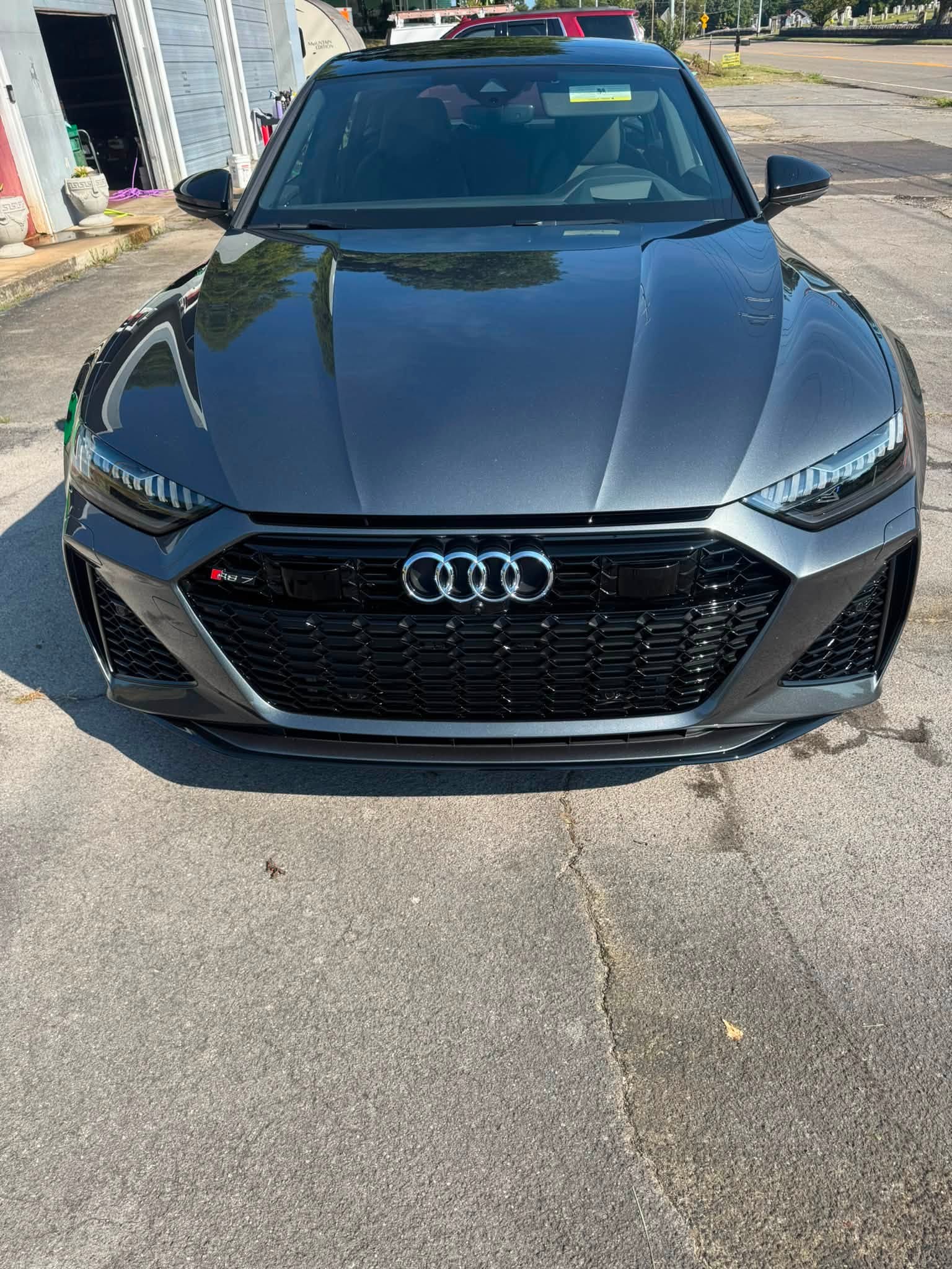 Glossy black Audi after detailing