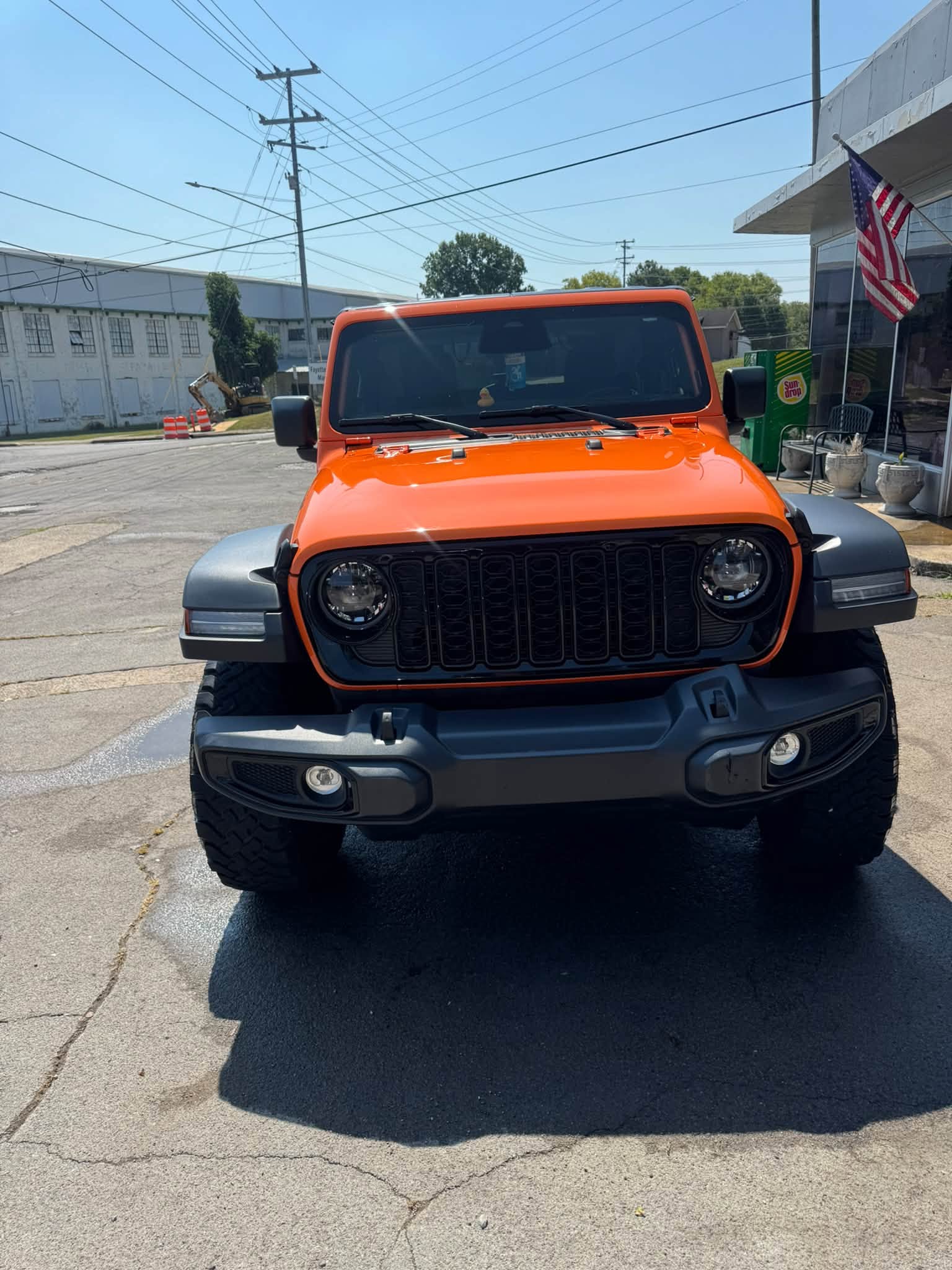 Bright orange Jeep after detailing